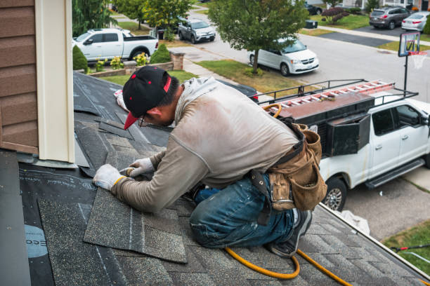 Professional Emergency Roof Repair technician working in Wellsville, KS
